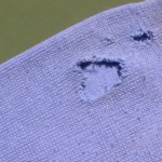 Déchirure pull en laine Un pull sérieusement abimé ..